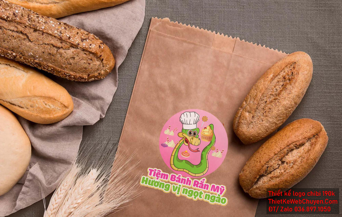Phối cảnh bánh ngọt trong mẫu vẽ chibi chú rắn đầu bếp bán bánh ngọt để thiết kế logo